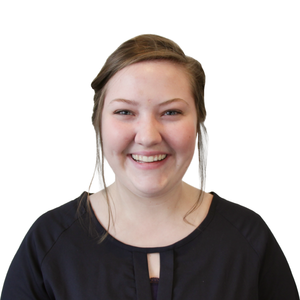 Headshot of a smiling woman with a black blouse.